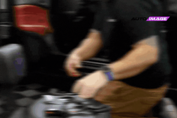 Auto Image technician installing a remote start system in a vehicle garage in New Jersey showcasing the importance of professional installation when choosing the right remote start system for compatibility and safety