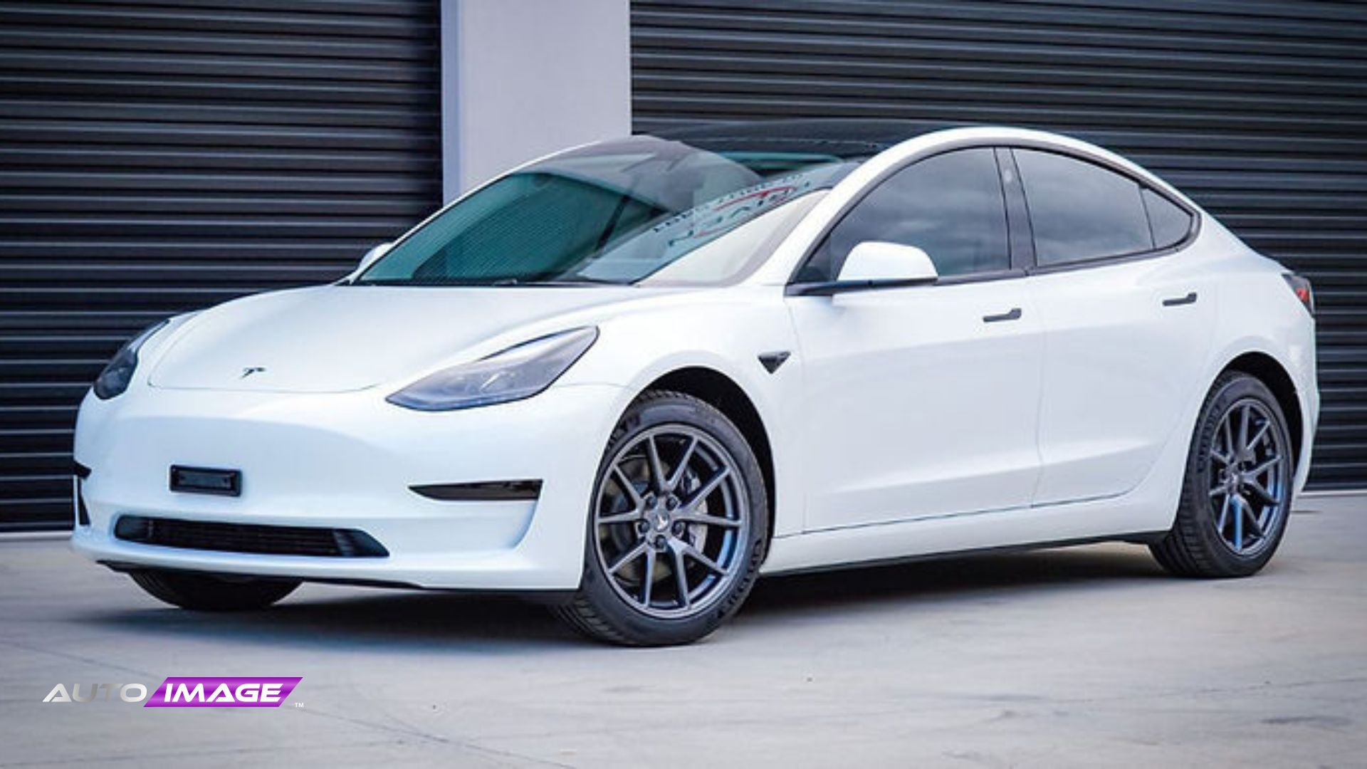 white Tesla with Window Film installation.